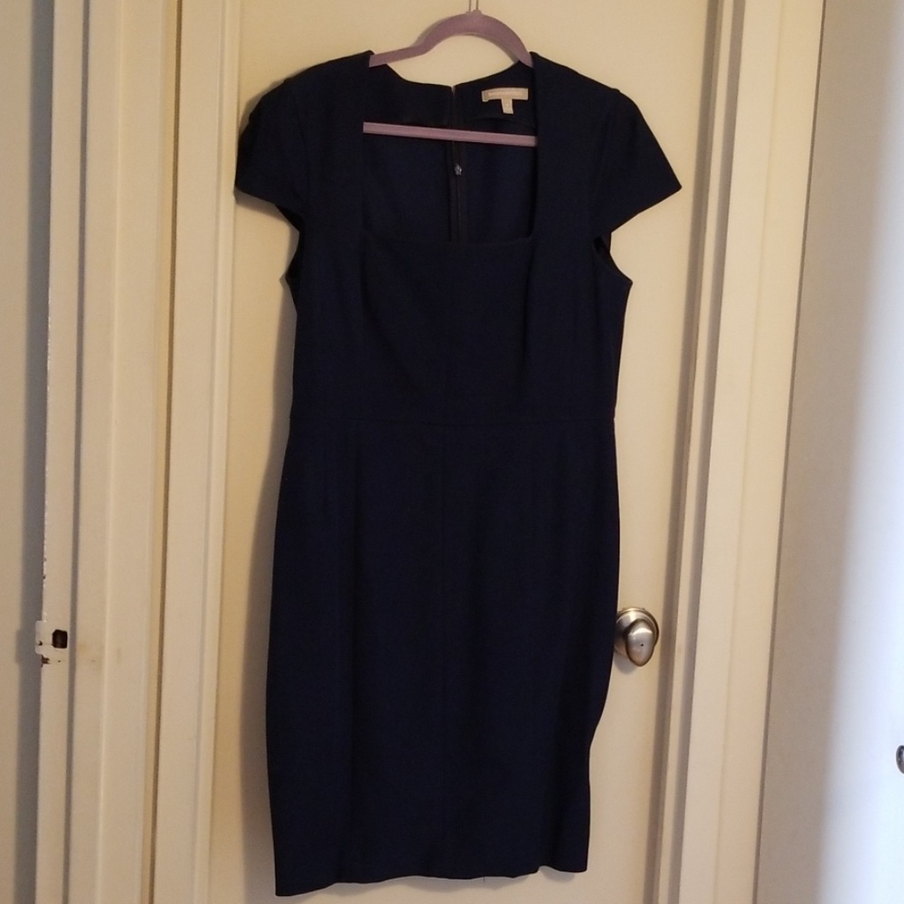 Navy dress fitted with stretch. Cap sleeve.